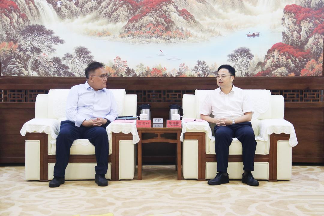 胡旭彬会见东软集团轮值首席执行官徐洪利一行